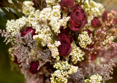 Arrangement using preserved white rice flower